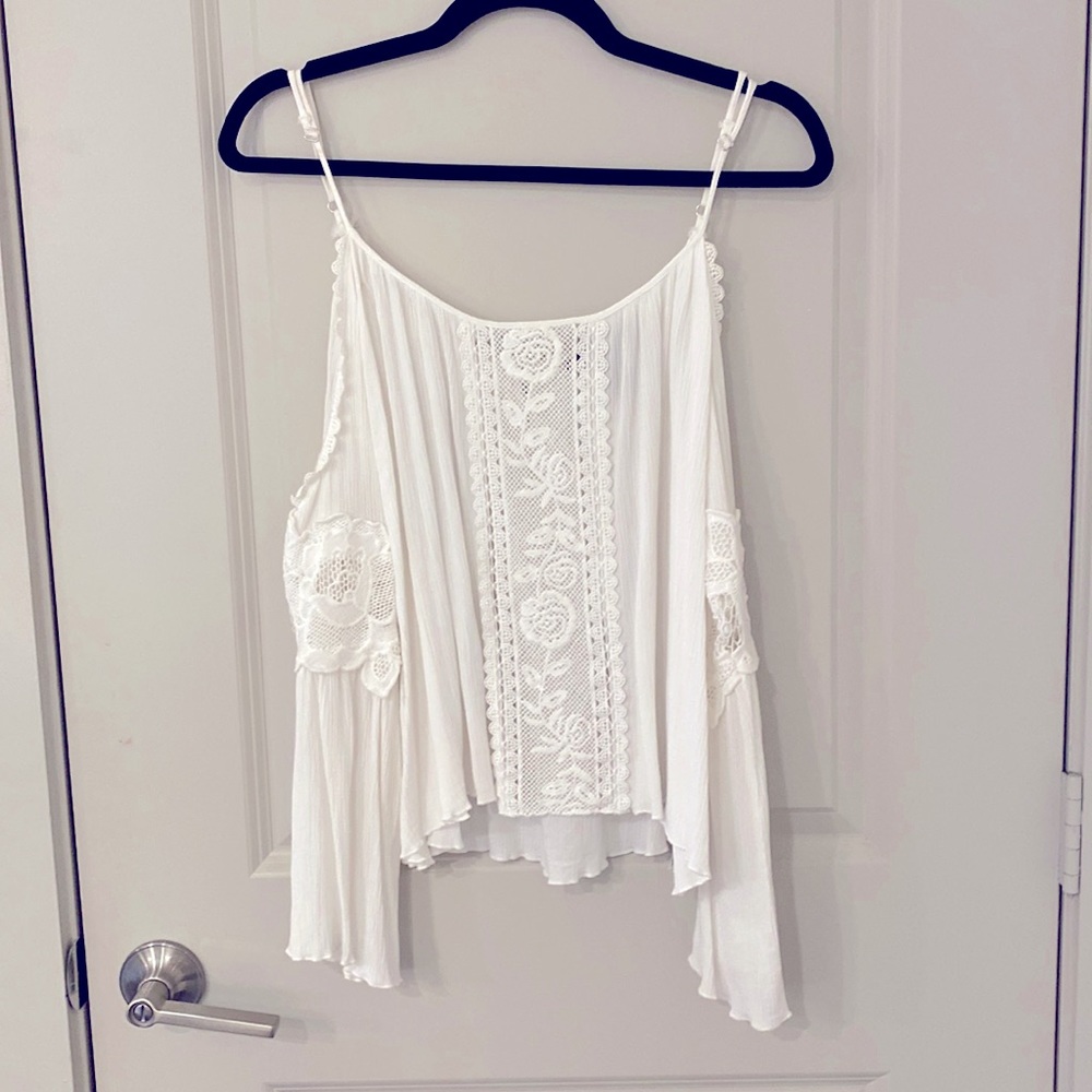 White off the shoulder strapless top.